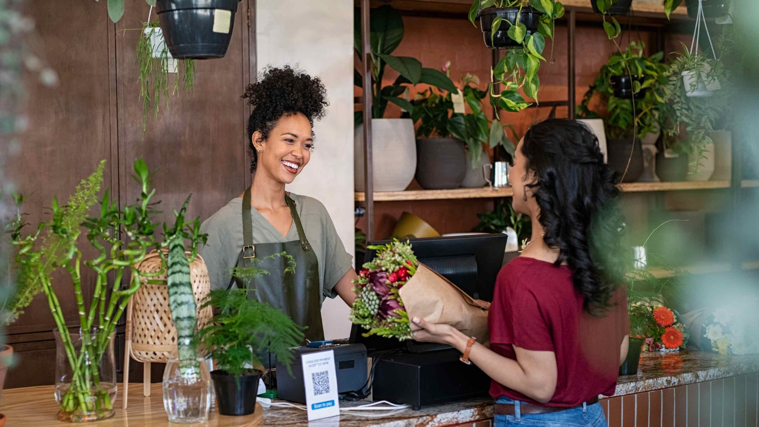 small business owner talking to a customer