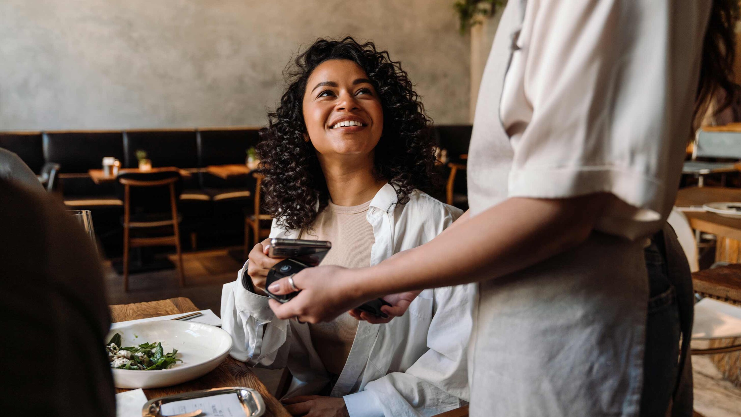 Customers enjoying a local business